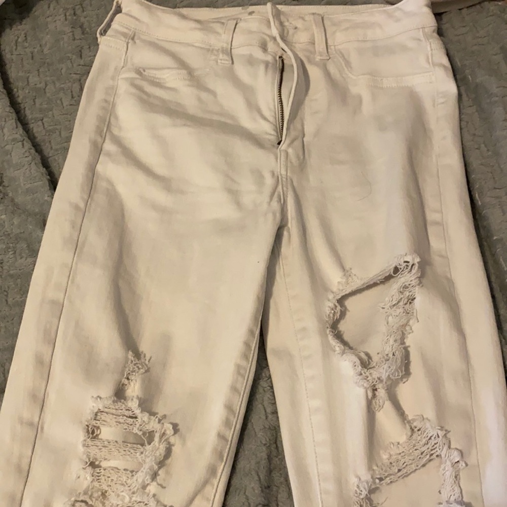 White ripped American eagle jeans